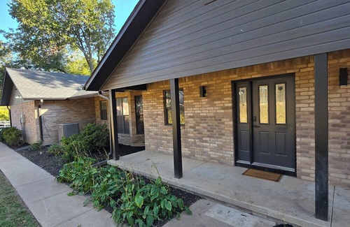 Grove House | Giant10-bedroom lakefront home with large pool, hot tub, and dock