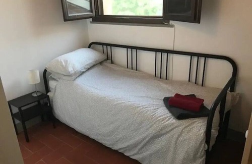 Lari Apartment | Tuscan 2 Bed Tower Apartment shared infinity pool & good cooking facilities