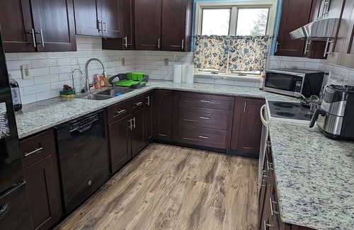 Levittown House | The Hexagon house in the Philadelphia suburbs. Sleeps 9, covered outdoor patio.