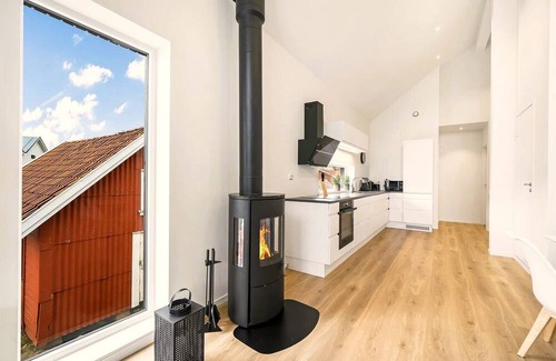 Vestbygd House | Holiday home 'Lista Maritim 5', built 2021, at the guest harbor in Borhaug-Borshavn near Farsund, Listafjorden, southern Norway, 7+2 persons, 135 m² living space, panoramic windows and south-facing balcony. south-facing balcony, modern furnishing.