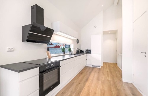 Vestbygd House | Holiday home 'Lista Maritim 5', built 2021, at the guest harbor in Borhaug-Borshavn near Farsund, Listafjorden, southern Norway, 7+2 persons, 135 m² living space, panoramic windows and south-facing balcony. south-facing balcony, modern furnishing.