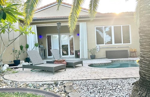 Miramar House | Beautiful lakefront retreat with outdoor kitchen, tiki hut and spa.