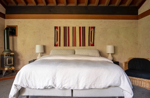 Olympic Valley House | One of a kind architectural gem! Riverfront redwood home sits on Truckee River.