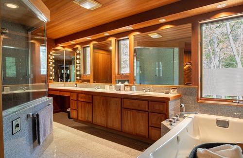 Olympic Valley House | One of a kind architectural gem! Riverfront redwood home sits on Truckee River.