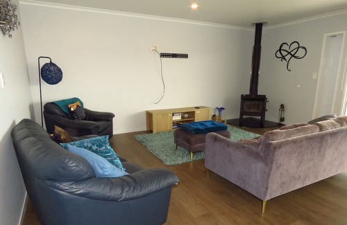 Cable Bay House | Above The Rest is positioned perfect with a view across the bay.