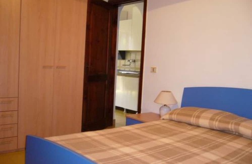 Giannella House | Holiday Home 'Residence Giannella - Pitosforo 46' with Private Garden and Air Conditioning