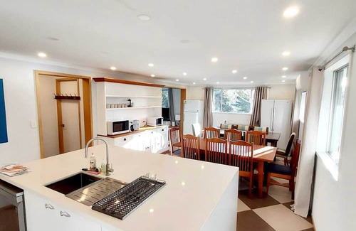 Jindabyne Cabin | HUGE 9 Bedroom house, 6 Bathrooms, 2 Lounge rooms, 2 kitchens, Private Gardens