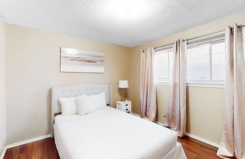 Richardson House | Private home with enclosed backyard, gas grill, sunny interior, & smart TVs
