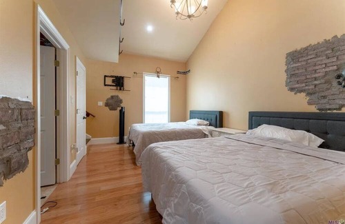 Maurepas House | House located on the Bayou-Sleeps 16. Fishing, WiFi, pool, AC, and pool table