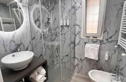 Zona XXXI Mezzocammino Apartment | Vrbo Property