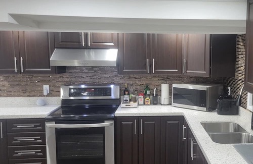 Malton House | Cozy basement apartment mins from the airport Hwy., Parks, mall and casino