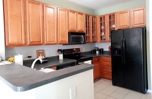 Greenville Condo | Cozy, light-filled fully furnished condo with pool.
