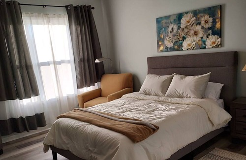 Greenville Condo | Cozy, light-filled fully furnished condo with pool.