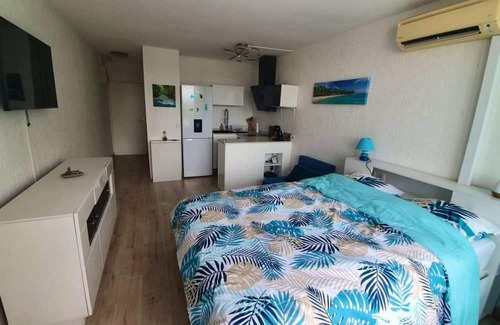 Pointe de la verdure Apartment | Homerez - 100 m away from the beach! Studio for 3 ppl. with shared pool