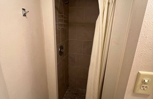 Onalaska House | Overlooking Lake Onalaska -- full-size bed + bath in nostalgic motel