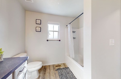 Meridian House | Newly built home with large fenced yard, 2 living rooms & great kitchen