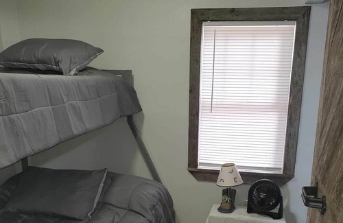 Chisago City Cabin | 40 Min from the cities, 4 ft from the shore! Sandy beach. Fish off the dock!