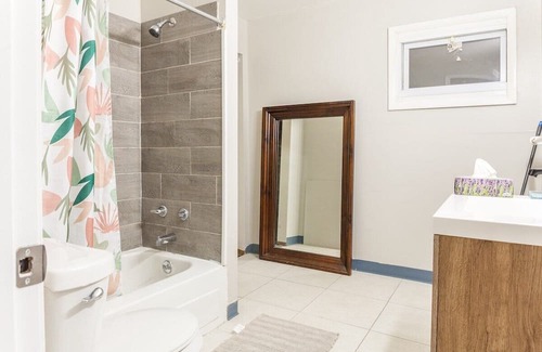 Front Park Apartment | This stylish yet cozy, two bed one bath space is perfect for solo and group trips
