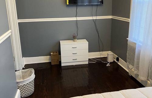 Irvington House | Four Single Bedrooms with hard wood floors.