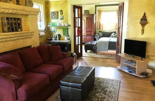 King Apartment | Cozy, comfortable 3-room "suite" in vibrant Alberta/Mississippi neighborhood.