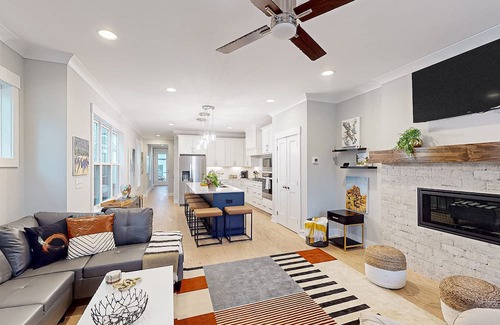 Apex House | Art-filled home near downtown with open layout & fireplace - dog-friendly