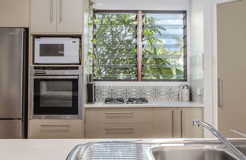 Pottsville Apartment | Escape to your own tropical oasis with this stunning retreat-style home boasting 4 large bedrooms, all with fans and robes, and 3 bathrooms.
