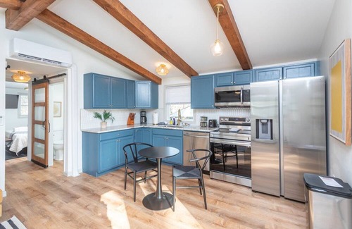 Elkton House | Riverfront with 2 homes featuring 7 bedrooms Outdoor Pavilion 2 Hot Tubs Fire Pit and Pool
