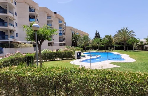 Los Puertos Apartment | Marina Horizon: Your modern seaside retreat