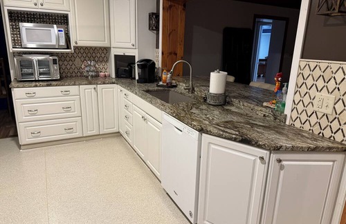 I-435 West KC-KS House | Spacious 4-bedroom house in west KCK just a few miles from several attractions!