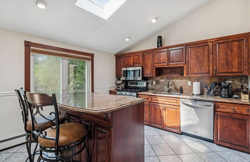 West Islip House | Relax in Style: Heated Pool, Golf Area, Gym & 2 Offices at Luxury Home