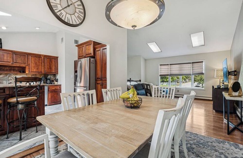 West Islip House | Relax in Style: Heated Pool, Golf Area, Gym & 2 Offices at Luxury Home