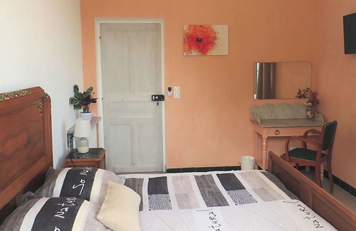 Valle-de-Campoloro Bed & Breakfast | A Caserella - Chambre d'hôte avec salle de bain non attenante et vue sur mer