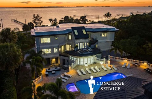 Fort Pierce Apartment | 9K SF Waterfront Mansion, Pool, Boat Dock, Theater
