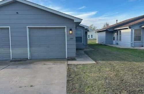 Enid House | 2107 Quiet West Side duplex, 1 king & 1 queen.