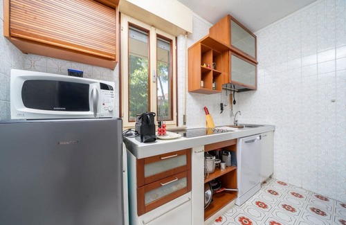 Grado Pineta Apartment | Cozy 56 sqm ground-floor apartment featuring a balcony running along the entire perimeter and a private garden, perfect for relaxation and tranquility. Located in Grado Pineta, a green and quiet area just steps from the sea and nature trails, it offers t