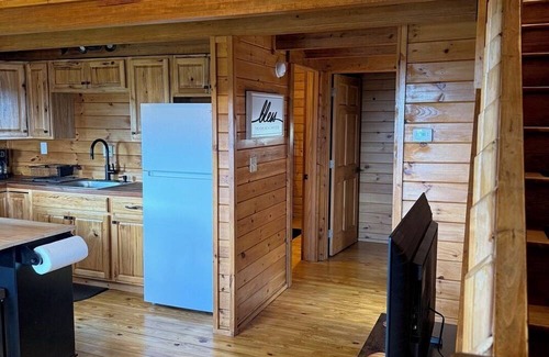 Delevan Cabin | Quiet Secluded Hilltop Log Cabin on a Gravel Road