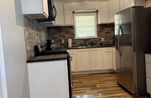 Plainview House | Charming 4-bedroom house with patio for grilling and large backyard in Plainview