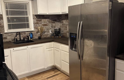 Plainview House | Charming 4-bedroom house with patio for grilling and large backyard in Plainview