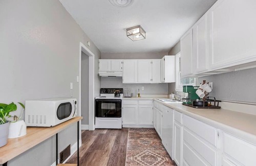 Prairie Village House | Feel at home in this charming house on a quiet street