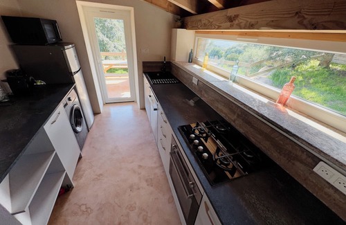 Grosseto-Prugna Ski Chalet | Authentic stone Caseddu in Porticcio with sea view