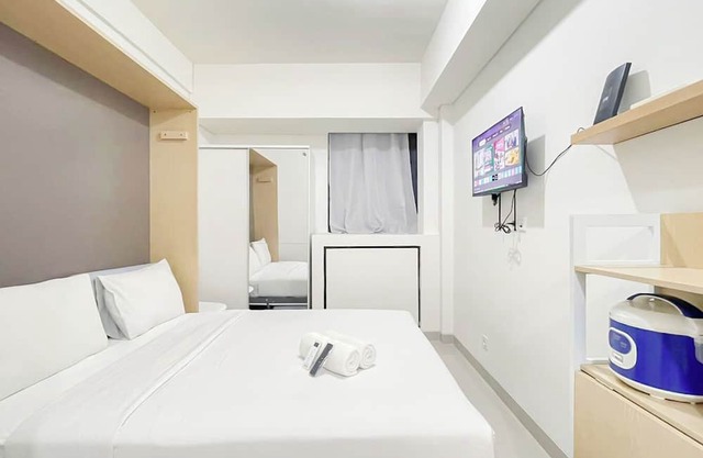 White Studio Room (No Kitchen) At Bandaraya - Tallasa City Makassar Apartment