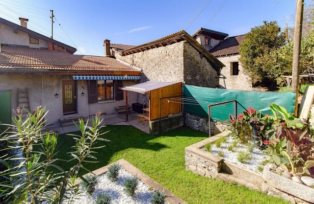 Historic house in the artistic village of Brè (THE SECRET GARDEN)