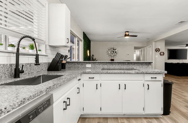 Charming 4-bedroom home in San Antonio with Pool, Sunroom, and game room
