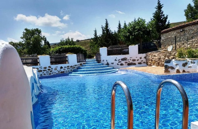 Holiday Home 'Moli Colomer' with Mountain View, Shared Pool and Private Terrace