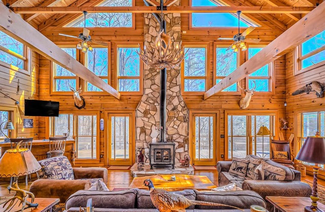 Spacious dog-friendly cabin with mtn views, game room, private hot tub, & deck