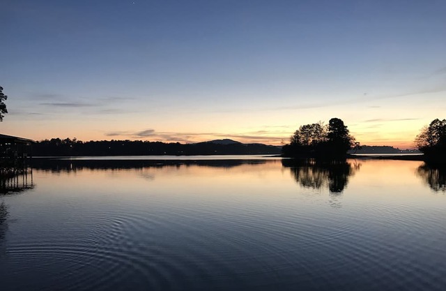 Lovely Lakefront House with level backyard with beautiful sky/sunset views!