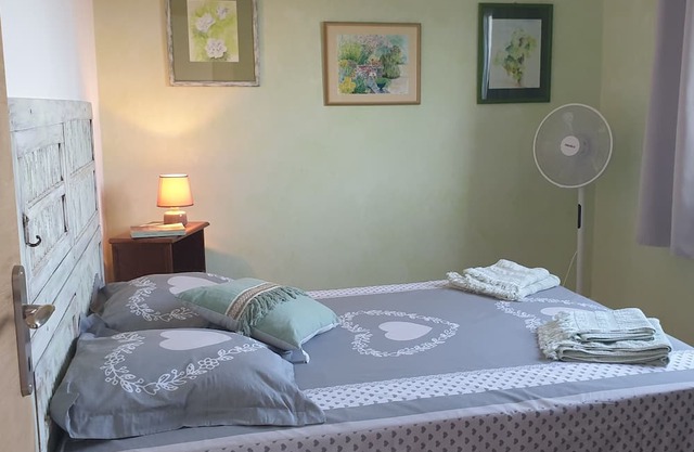 Quadruple room (2 bedrooms) in a village house "A Caserella"