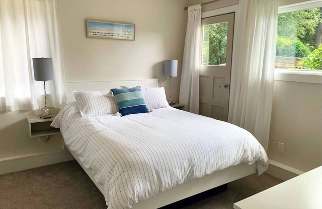 Sun drenched, beach inspired, guest suite.