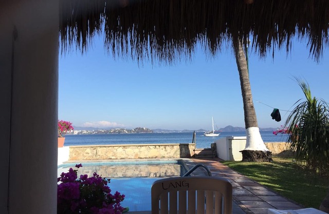 Casa Lang 4 BR/Bath pool on flat calm beach steps to restaurants in secure area.