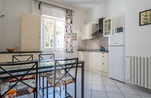 Homiday - Via Gramsci, Azure Two-Bedroom Apartment
